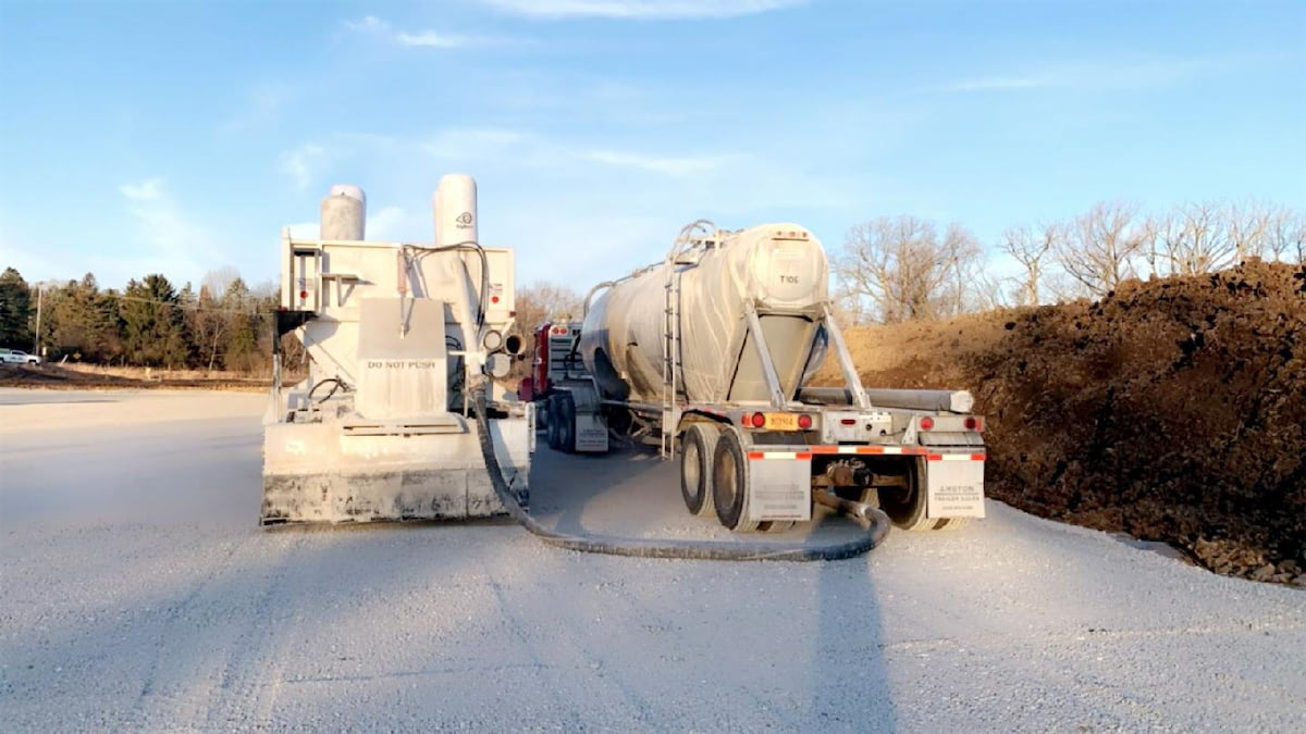 truck driving on a gravel road